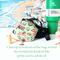 The bottom of a green sushi print Side Snap water bottle bag is displayed with a 40 oz Stanley Quencher tumbler, a pencil and chap stick.
